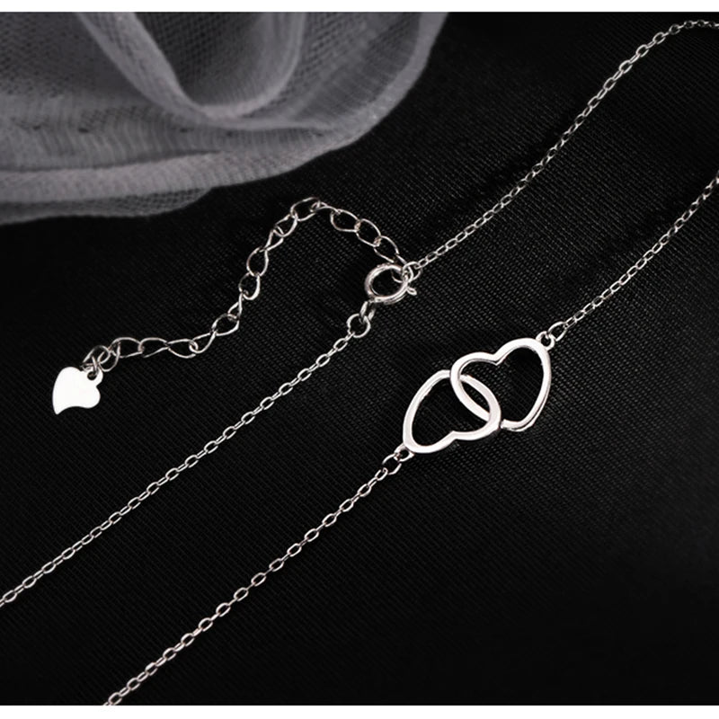 Collier ALORA Double Cœur argentée – Bijou Élégant et Romantique pour Femme