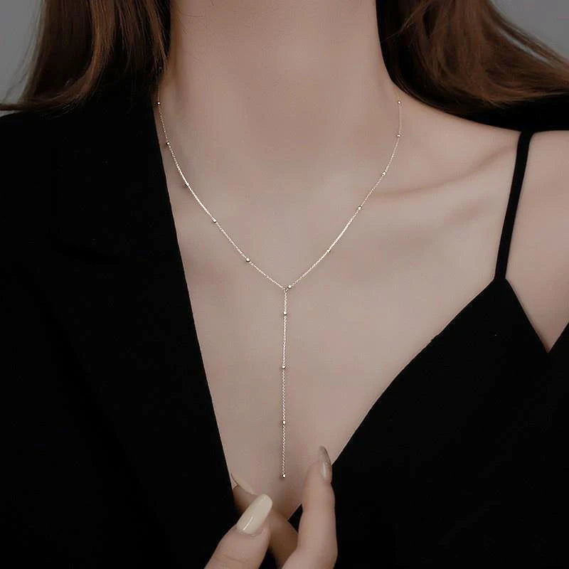 Collier ALORA Long Double Rang avec Perles Géométriques – Bijou Chic & Raffiné