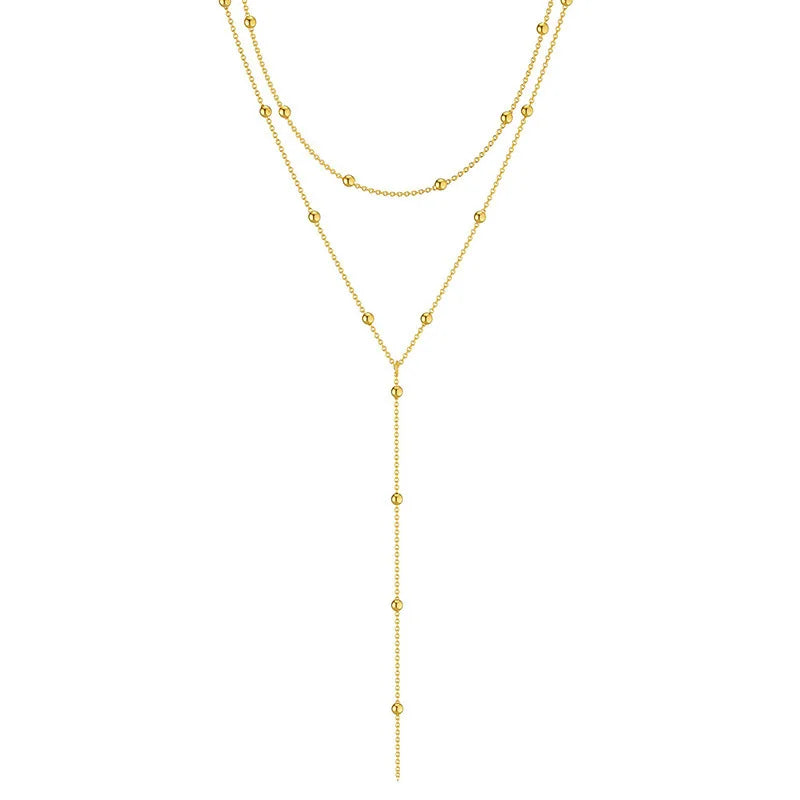 Collier ALORA Long Double Rang avec Perles Géométriques – Bijou Chic & Raffiné